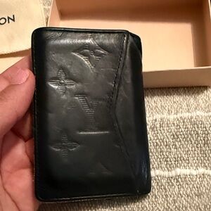 Louis Vuitton men’s very loved wallet Black Embossed Leather Wallet